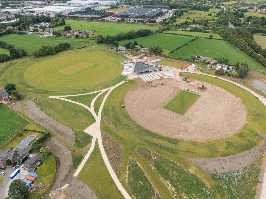 Drone shot of the pavillion and pitches under construction